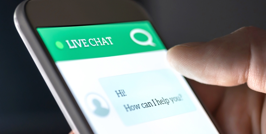 Customer service and support live chat with chatbot and automatic messages or human servant. Assistance and help with mobile phone app. Automated bot and robot. Smartphone helpdesk for feedback cell.